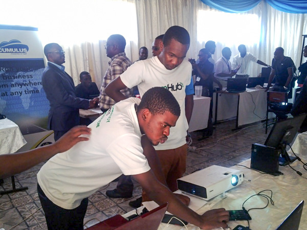 The mHub team setting up their station.